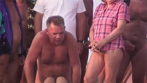 Amateur receives nudist group sex in public in HD